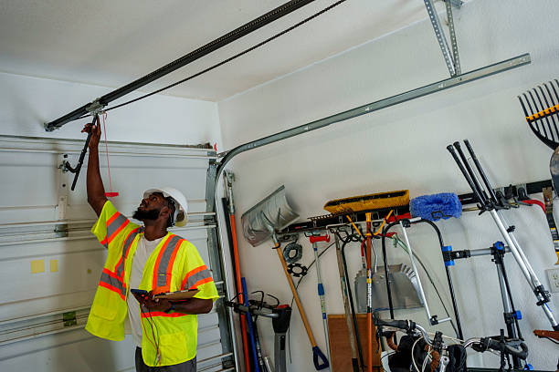 Professional Garage Door Panel Replacement technician working in Audubon, NJ